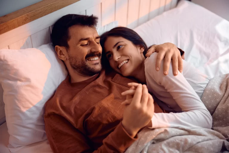 young embraced couple enjoying in their morning to utc