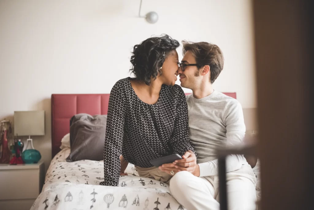 young handsome mixed race couple in their house si utc